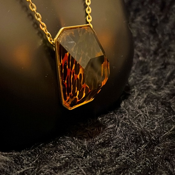 Gold and Cheetah print necklace and earring set. Adjustable from 9-10.5 inches. - Picture 3 of 4